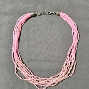 Soft pink small beads necklace.